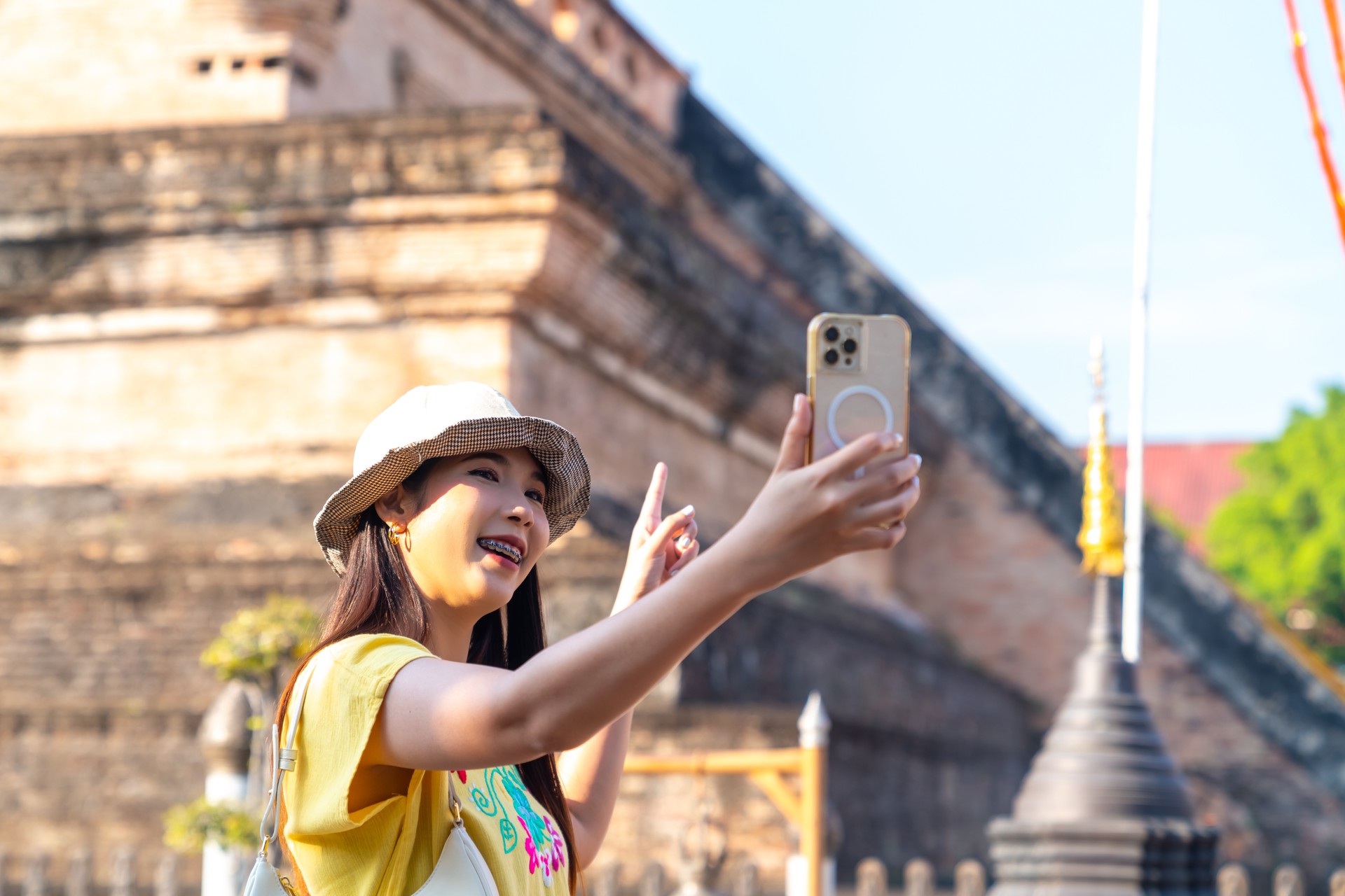 Asian woman travel Buddhist temple in Chiang Mai, Thailand.